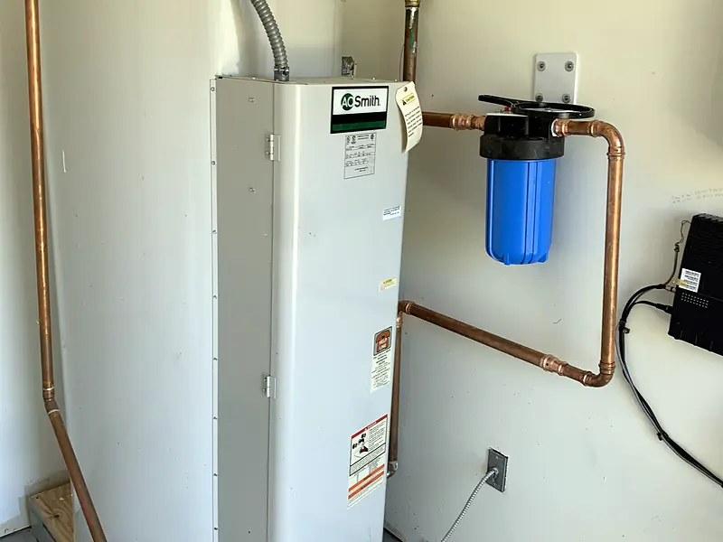 New electric water heater with a whole-house filter and copper lines