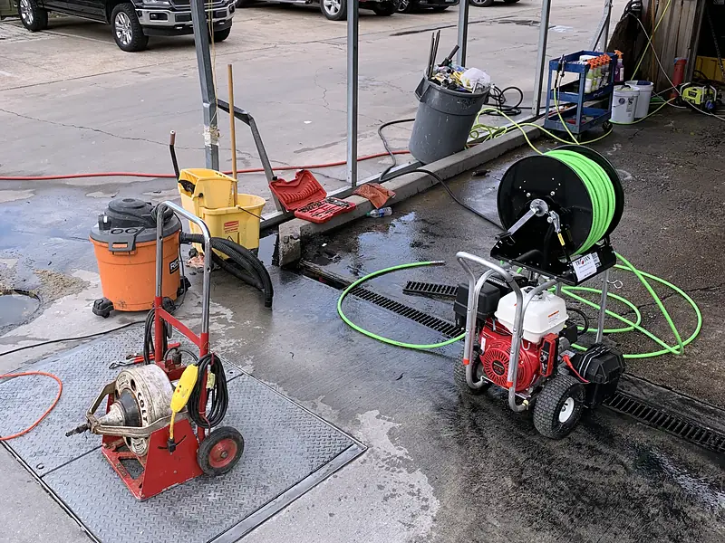 Hydro jetter, cable machines and wet vac in the Royal Flush Affordable Plumbing shop bay