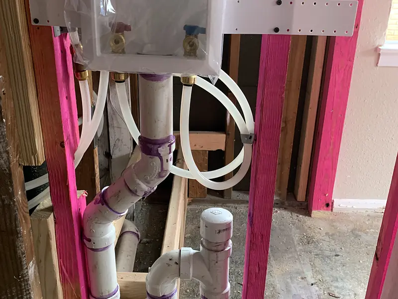 New washing machine box and drain roughed in on new framing