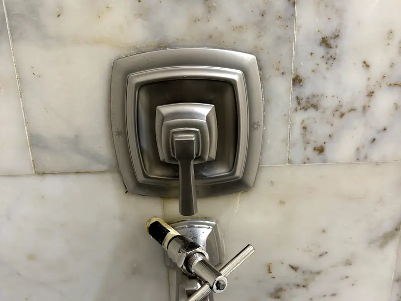Shower valve on marble, after